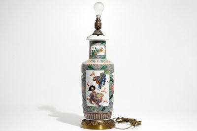 A bronze-mounted Chinese famille verte rouleau vase, transformed into a lamp, 19/20th C.