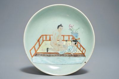 A Chinese famille rose celadon-ground plate with erotical design, 19th C.