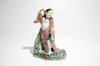 A Chinese famille rose figure of Liu Hai with the toad, 20th C.