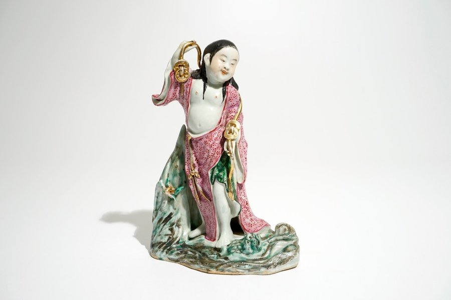 A Chinese famille rose figure of Liu Hai with the toad, 20th C.