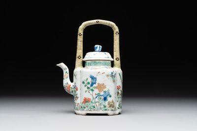 A Chinese famille verte 'flower and butterfly' teapot with an upright handle, Kangxi