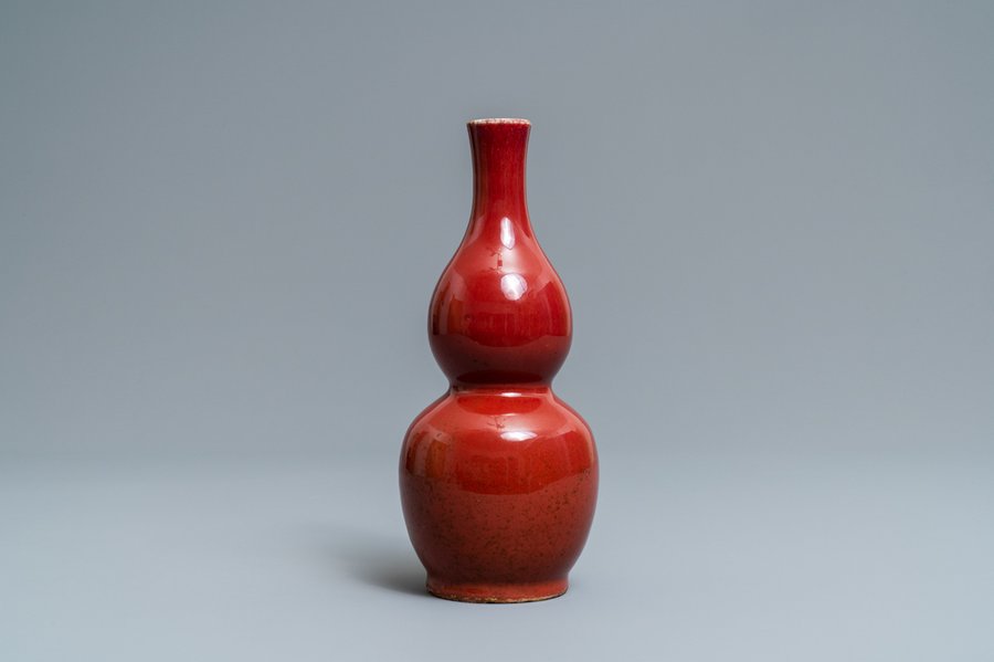 A Chinese monochrome sang-de-boeuf double gourd vase, Qianlong mark, 19/20th C.