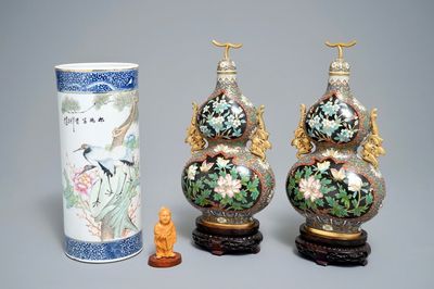 A Chinese qianjiang cai hat stand, a pair of cloisonné vases and a carved wood figure, 20th C.