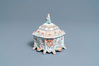 A Dutch Delft polychrome petit feu tobacco box and cover with a seated Chinaman, 18th C.