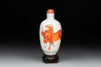 A fine Chinese iron-red and grisaille 'horse and man' snuff bottle, 19th C.