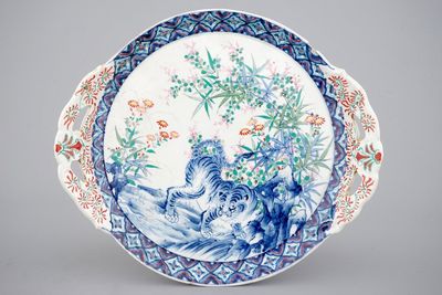 A Japanese porcelain dish decorated with a tiger, 19th C