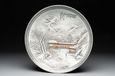 A large Chinese 'winter landscape' dish in the style of He Xuren 何許人, signed Rao Yongchang 饒永昌, dated 1902