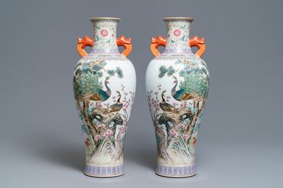 A pair of Chinese famille rose 'peacock' vases, Qianlong mark, Republic, 20th C.
