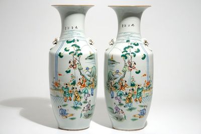 A pair of Chinese famille rose vases with playing boys, 19/20th C.