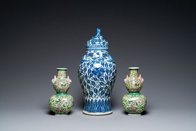 A pair of Chinese famille verte double gourd vases and a blue and white vase and cover, 19/20th C.