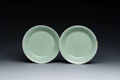 A pair of Chinese monochrome celadon-glazed plates, Qianlong mark and of the period