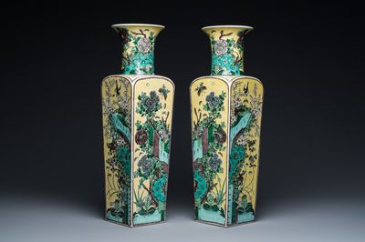 A pair of Chinese square yellow-ground famille verte vases, Kangxi mark, 19th C.