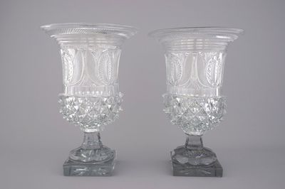 A pair of large cut glass urns on stand, probably Voneche, early 19th C.