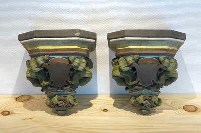 A pair of polychrome plaster consoles, 19/20th C., Bruges