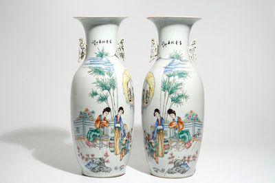 A pair of tall Chinese famille rose vases with figural design and calligraphy, 19/20th C.