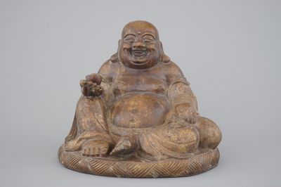 A partial gilt seated bronze buddha, Yongzheng mark, 19th C. or earlier