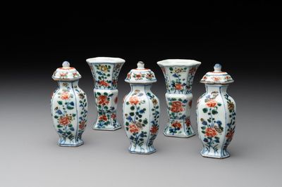A rare Chinese famille verte garniture of five miniature vases with floral design, Kangxi