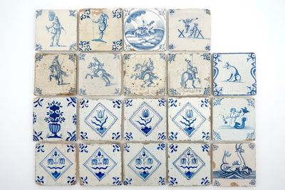 A set of 19 antique Dutch Delft blue and white tiles, 17/18th C.