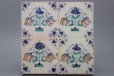 A set of 4 polychrome floral Dutch Delft tiles ca. 1620