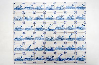 A set of 47 Dutch Delft blue and white seacreature tiles, Pulinckx workshop, Bruges, 18th C.