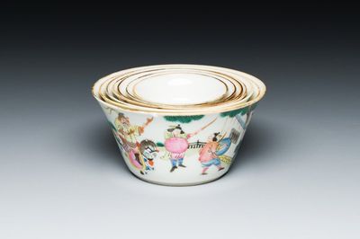 A set of seven Chinese famille rose nesting bowls with narrative design, Daoguang