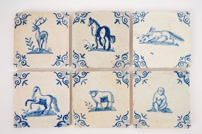 A set of six blue and white Dutch Delft tiles with animals, 17th C.