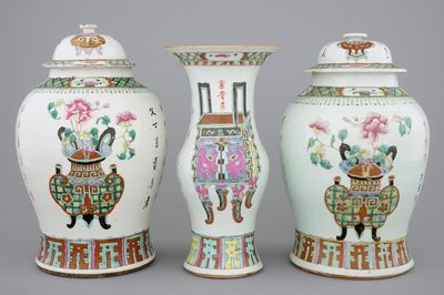 A set of three Chinese famille rose vases, 19th C.
