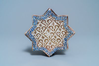 A star-shaped luster-glazed tile, Kashan, Iran, 14th C.