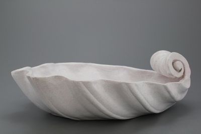 A white glazed champagne cooler shaped as a shell, France, 19th C.