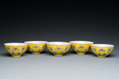 Five Chinese famille rose yellow-ground 'butterfly' bowls, Tongzhi mark and of the period