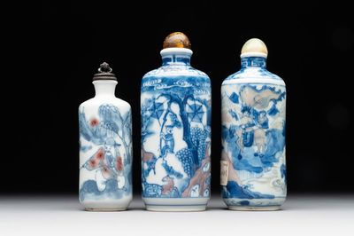 Three Chinese blue, white and copper-red snuff bottles, Yongzheng mark, 19/20th C.