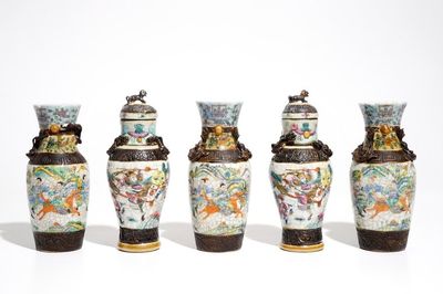 Two Chinese Nanking famille rose covered vases and three Nanking famille verte vases, 19th C.