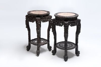 Two finely carved Chinese marble-topped hongmu stands, 19th C.