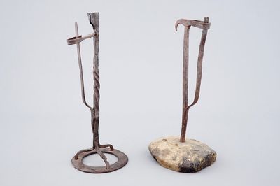 Two wrought iron candlesticks, 17th C.
