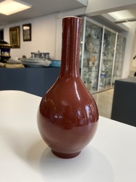 A Chinese monochrome dark ruby-red-glazed bottle vase, Qianlong mark and of the period
