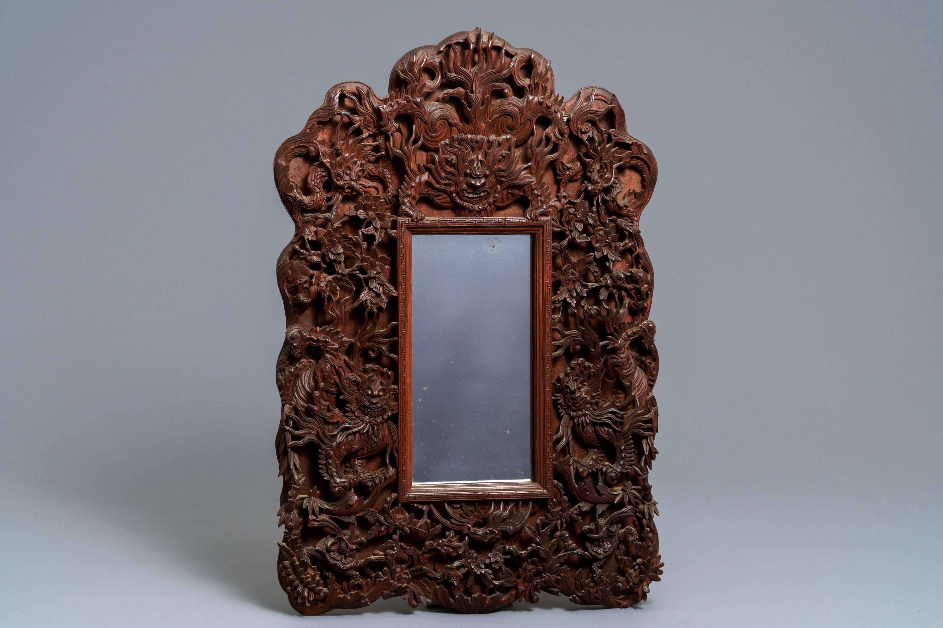 Two Chinese carved wood frames with dragons and figures, ca. 1900 Rob