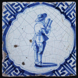 A set of 15 Dutch Delft blue and white tiles with various scenes of people, Wan-Li corners, 17th C.
