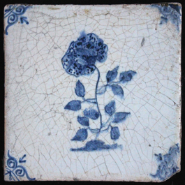 A set of 4 Delft blue and white tiles with various scenes, possibly Lille or Ghent, 17th C.
