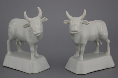 A pair of Dutch Delft monochrome white figures of cows, 18th C.
