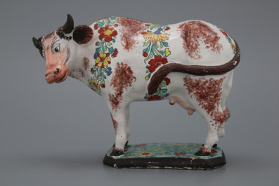 A petit feu and dor&eacute; Dutch Delft cow, 18th C.