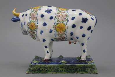 A polychrome Dutch Delft cow, 18th C.