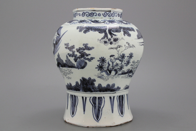 A Dutch Delft blue and white baluster vase in transitional style, late 17th C.