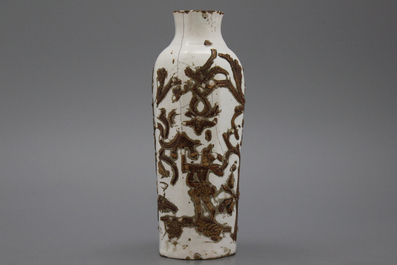 A German relief-decorated Ansbach or Berlin vase, 18th C.
