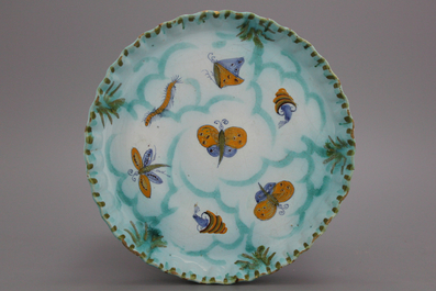 A Brussels faience butterfly plate, 18th C.
