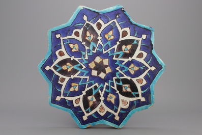 A Timurid cuerda seca star-shaped tile, 15th C.