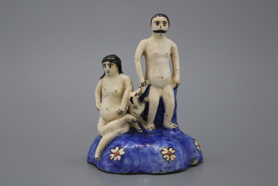 A Qadjar figural group with a nude man and woman with a dog, 19th C.