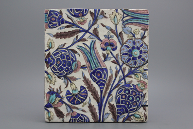 A floral Qadjar Iznik-style relief tile, early 19th C.