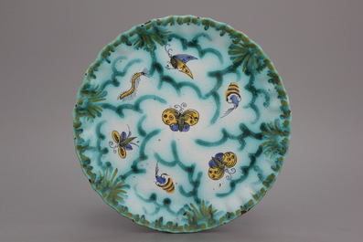 A notched Brussels faience butterfly plate, 18th C.