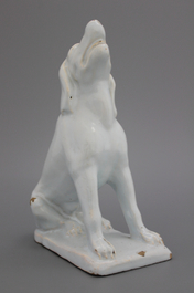 A pair of Brussels faience white figures of dogs, 18th C.