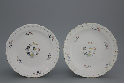 A pair of lobed Brussels faience &quot;floral hedge&quot; plates, 18th C.